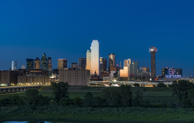 From Modera Trinity, you can enjoy a breathtaking view of the Dallas skyline at night.