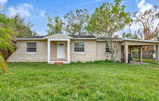 Recently Updated 2-Bedroom Gem with Original Wood Floors and Large Fenced Yard