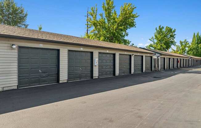 A long row of garage doors are closed.