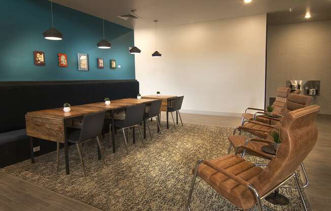 a conference room with a long wooden table and chairs