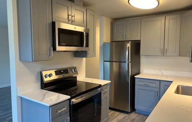 Ekilai Apartments - Spacious 1 Bed, 2 Bed Units & 3 Bed Units, w/ Private Balcony ~ Designer finishes + W/D in Unit!
