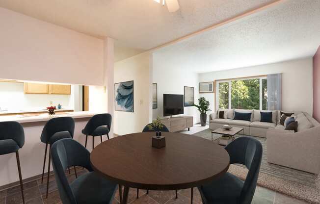 Bismarck, ND Bradbury Apartments. The room features a four-chair dining table with bar stools and a glimpse of the living room in the background. Soft lighting creates a warm and inviting atmosphere, while a window brings in natural light. It's a comfortable space for dining and relaxing with a seamless connection to the living room area