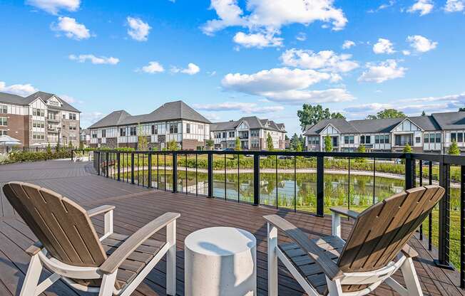 Deck and chairs overlooking the courtyard pond