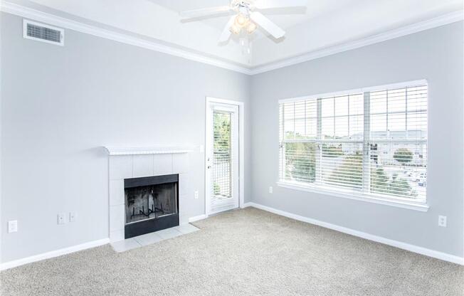 Fireplace in bright living room of Estancia Apartments For Rent Tulsa OK - 1, 2 , and 3 Bedroom Units Available