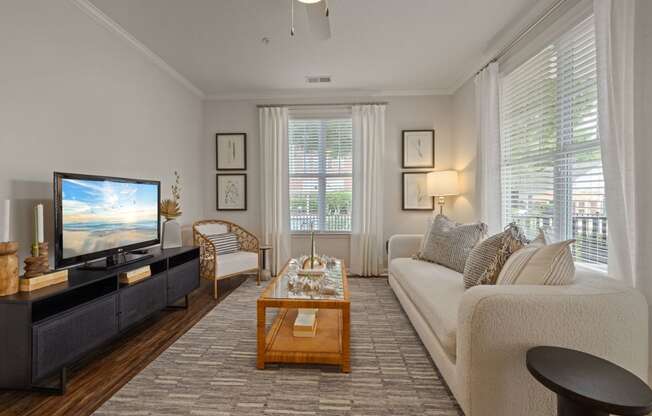 a living room with a couch and a television