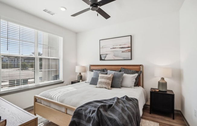 a bedroom with a bed and a ceiling fan at Stella, San Tan Valley Arizona