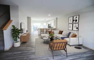 a living room with a couch and a table