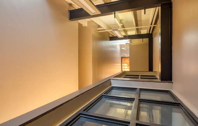 a view of a glass floor in a hallway