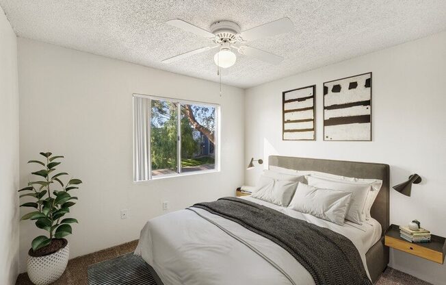 Model classic apartment bedroom with window and ceiling fan