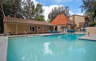 Swimming Pool And Relaxing Area at St. Charles Oaks Apartments, Thousand Oaks, CA