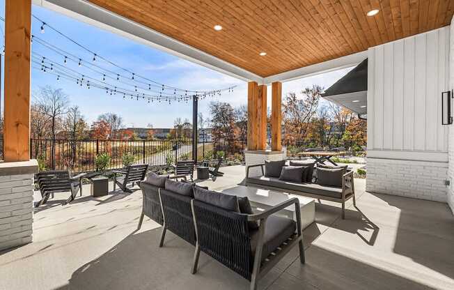 A patio with a table and chairs is shown.