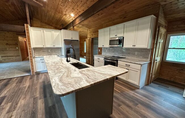 NEWLY REMODELED FARMHOUSE STYLE HOME ON THE 13TH HOLE OF THE WOODMOOR GOLF COURSE!!!!