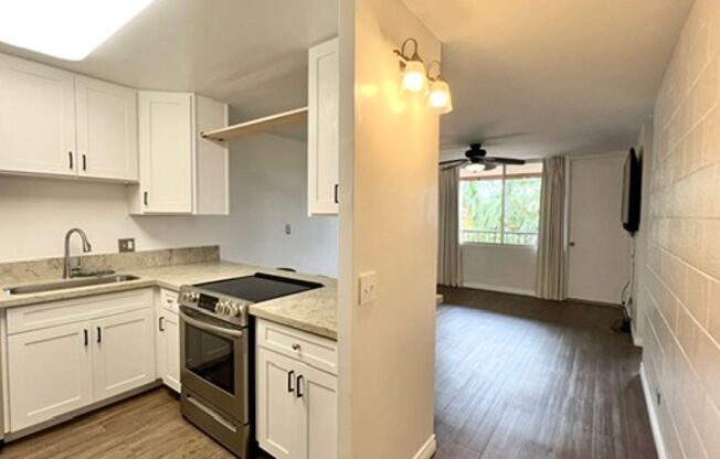 AVAILABLE NOW!  Spacious 3-Bedroom, 2-Bath Corner-end Split-level Unit in Kaneohe with 1 Assigned Parking Stall