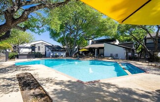 Experience luxury living at The WerX, where modern design meets vibrant community vibes. Enjoy our stunning pool surrounded by lush landscaping, perfect for relaxation or entertaining friends. Explore your new home today!