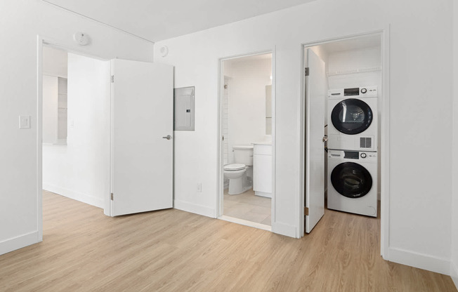 Bedroom with In-home Washer and Dryer