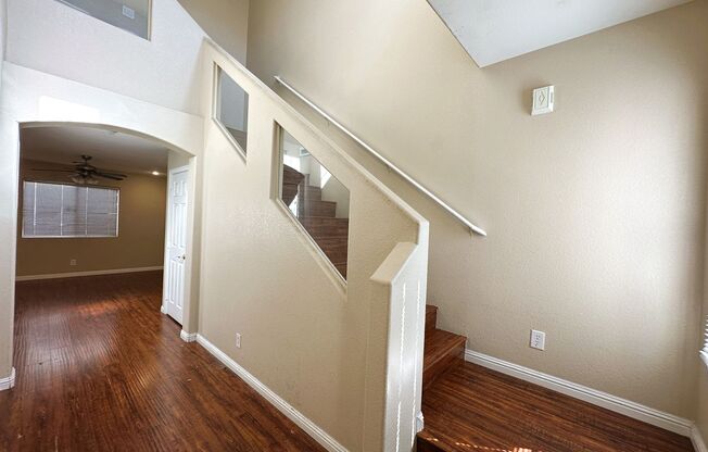 BEAUTIFUL 2 STORY HOME WITH HARDWOOD FLOORING! 3 BED 2 BATH, MASTER BEDROOM HAS ITS OWN PRIVATE BALCONY!! COMMUNITY POOL & PLAYGROUND!