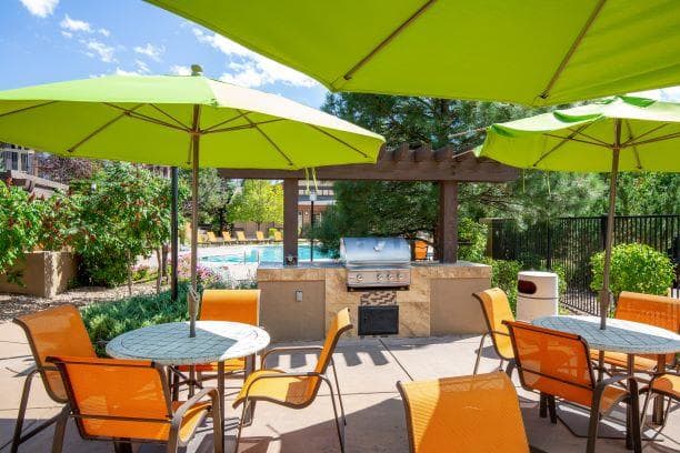 Outdoor Grill With Intimate Seating Area at Echo Ridge Apartments, Colorado