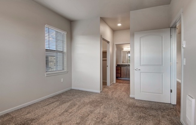 Beautiful Primary Bedroom | Apartments in Tualatin, OR | River Ridge