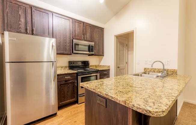 Fully Equipped Kitchen at Waterford Place Apartments & Townhomes, Overland Park