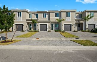 Brand new 3 bed 3.5 bath Townhouse with yard, garage and impact-resistant windows within Luxurious Community Terra Sol