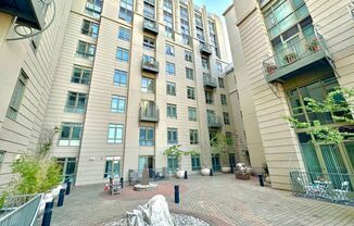 Turn Key Furnished 1 BR, 1 BA with Secure Parking and Rooftop Views