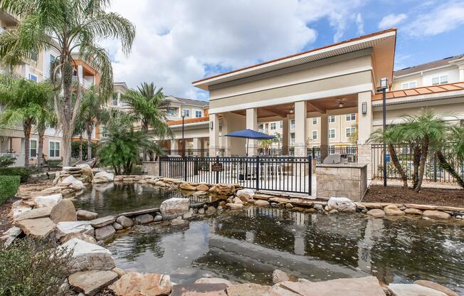 a large pool of water in front of a building