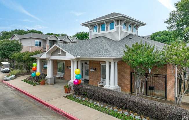 a home with balloons in the front yard