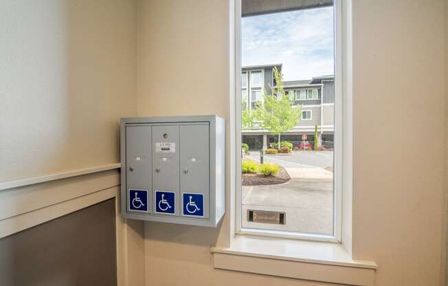 a control panel next to a window with a street view