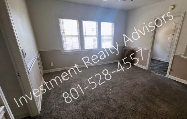 141 E 1 AVE