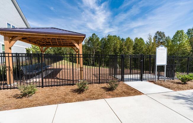 One of two dedicated dog parks at Amavi Brier Creek, offering a convenient place to play and socialize within this thoughtfully planned Durham community.