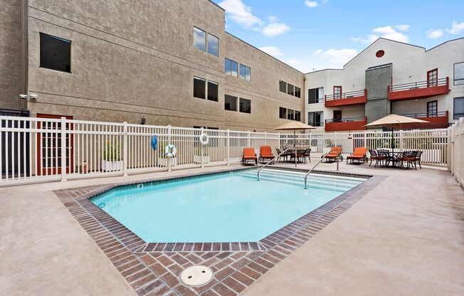 Apartments in North Hollywood - Woodland Trio - Sparkling Pool, Sun Lounge Chairs, and Pool Canopies