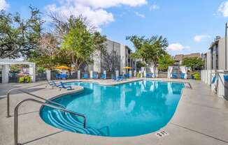 the swimming pool at the enclave apartments