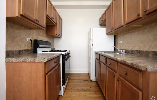 The Edison apartments kitchen with wooden cabinets