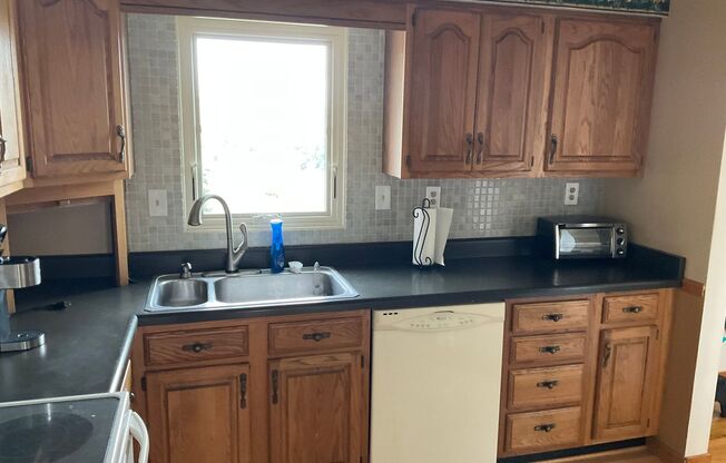 Private Split-Level 3bed 1.5 bath Retreat with Expansive Backyard & Versatile Living Spaces