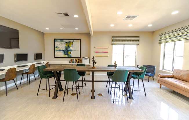 the reserve at bucklin hill leasing office common area with table and chairs