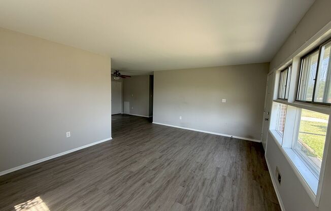 Charming Parkville Single Family Home with Sunroom & Private Backyard