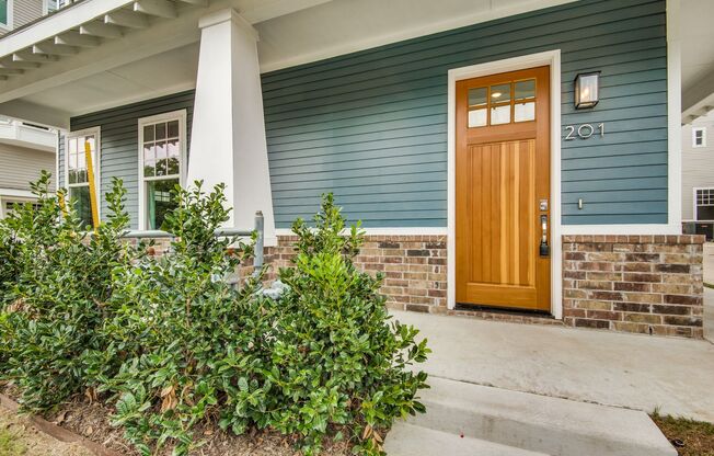 Welcome to a beautiful Craftsman-style Townhome