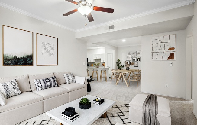 a living room with a couch and a coffee table at La Ventura Apartments, Plano, 75093