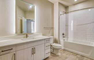 A bathroom with a bathtub and a toilet at Windsor South Congress, Austin, 78745