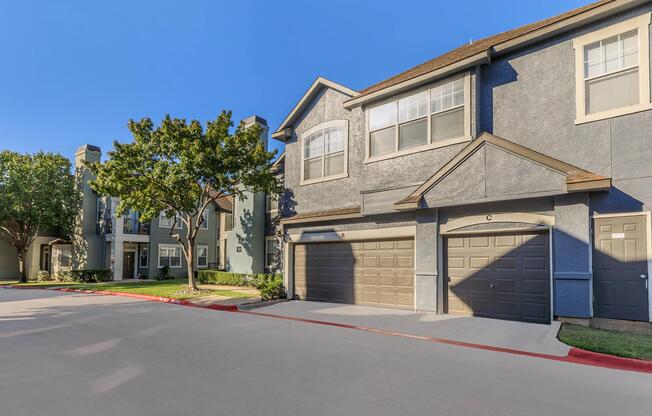 a road with a building in the background