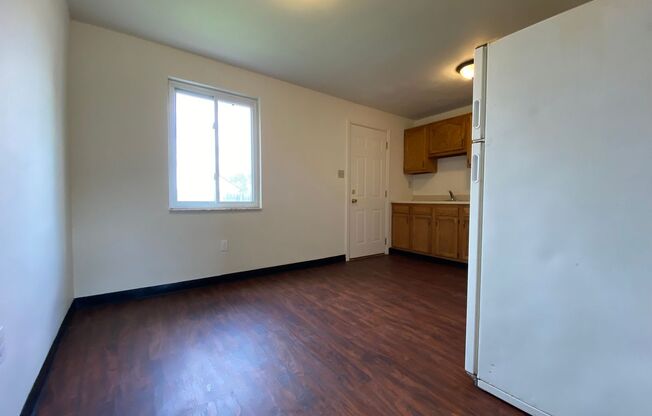 Cozy Two Bedroom Townhome with Central AC & Off-Street Parking! Call Today to Schedule a Tour!