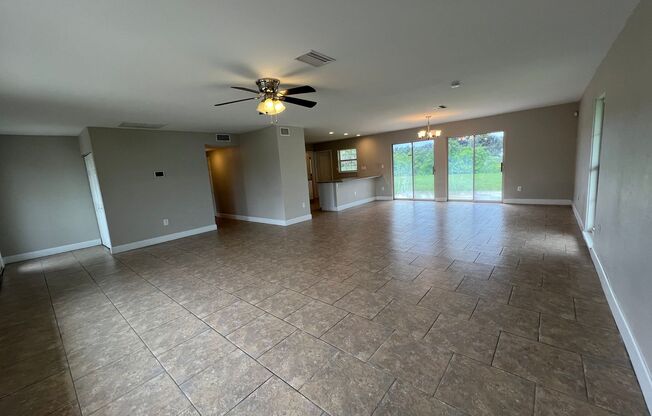 $1,795 ** AVAIL 7/15/25 ** 3 Bed / 2 Bath Single Family Home on the Canal ** Large Fenced in Yard on the Water