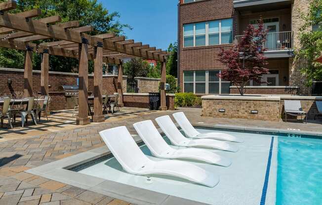 our apartments have a resort style pool with lounge chairs