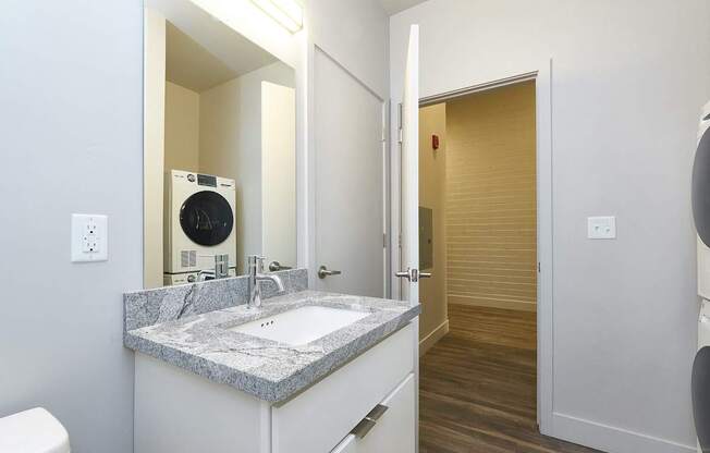 Laundry area at Brickside Heights Apartments, Millcreek, UT