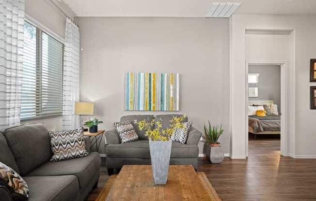 a living room with a couch and a coffee table