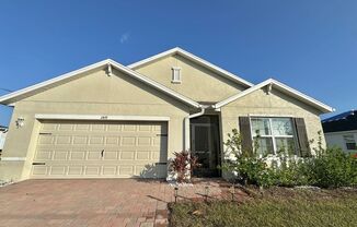 Beautiful and Spacious 4-Bedroom, 2-Bath Home with Washer & Dryer, Screened Porch and More in NW Cape Coral!