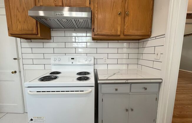 Spacious Multi-Level Living with Vaulted Ceilings and Backyard Access
