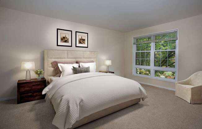the master bedroom has a neutral color scheme and a large bed