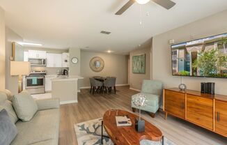 Living Room With Kitchen View at The Boot Ranch Apartments, Florida