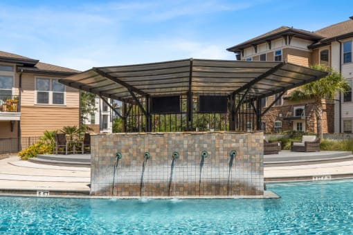 Swimming Pool with a Waterfall at The Loree, Jacksonville, FL, 32256